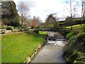 Footbridge and weir on the Belne Brook at Hillpool