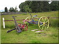 NM9346 : Farm  machinery  near  Kinlochlaich  cemetery by John Waring