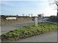 Milestone on a junction on the B3254 south of Congdon