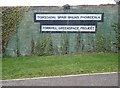 Bilingual signs at the entrance to the Forkhill Greenspace Project