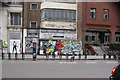 TQ2981 : View of graffiti on 54 Great Marlborough Street by Robert Lamb