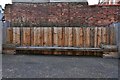 Diss: Bench with a message by the Corn Exchange