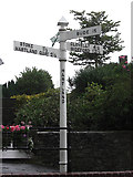 SS2624 : Direction Sign - Signpost by the B3248, Fore Street, Hartland by Tim Jenkinson