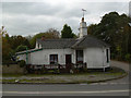 Old Toll House by Colleton Mills Cross