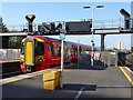 Train arriving at platform 3, East Croydon