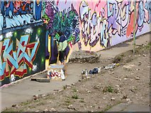NT2676 : Graffiti artist at work by Oliver Dixon