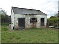 Old building beside the road in Dolfor