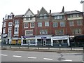 SX4854 : Terrace of shops, North Hill by David Smith