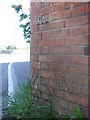 Benchmark on the side of the White Horse