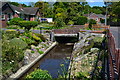 Stream through front gardens in Oak Road