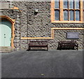 Wooden benches near the entrance to Brondeifi Unitarian Christian Church, Lampeter