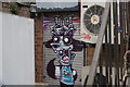 View of shutter art in a small yard in a back alley off Penge High Street