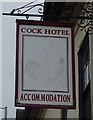 Faded sign for the Cock Hotel, Wellington