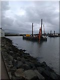 C8540 : Dredging Portrush Harbour by Willie Duffin