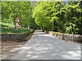 Road (B898) at the entrance to Kinnaird House