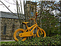 Yellow bike outside Oakworth church