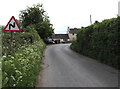 SO5318 : Bends warning sign, Llangrove Road, Trewen, Herefordshire by Jaggery