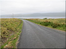 NS2589 : Minor road descending to Faslane Port and Gare Loch by Peter Wood