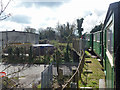 Train crossing bridge over Gas Road