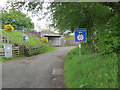 NS9834 : Westside Road joining Burnhead Road as it passes under a railway bridge by Peter Wood