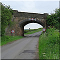 SK6266 : Edwinstowe: railway bridge over Mill Lane by John Sutton