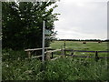 Footbridge and footpath sign near Stow Farm