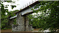 Walking under the Wye Railway Bridge beside the River Wye