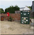 Queen Elizabeth II postbox and a donations bin in Shurdington