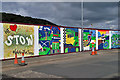 NT4935 : Colourful site hoarding at Huddersfield Street, Galashiels by Walter Baxter