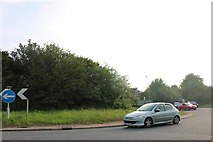 SK9974 : Roundabout on Lincoln Road, Riseholme by David Howard