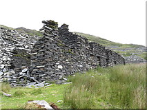 SH5745 : Ruined buildings at Gorseddau quarry by Gareth James