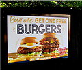 ST3091 : Flaming Grill burgers advert on an Almond Drive fence, Malpas, Newport by Jaggery