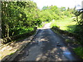 Minor road and Bridge of Tully crossing Alyth Burn