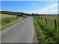 Minor road and arable fields between Kelvin and Cult