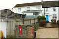 Postbox and houses, Wilcove