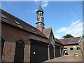 TQ2730 : The Clock Tower and Coach House at High Beeches by Marathon