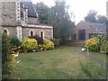 TQ2289 : Public garden at Our Lady of Dolours Church, Hendon by David Howard