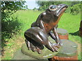 Carved frog sculpture