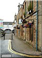 Signs and hanging baskets