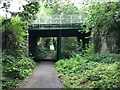 Road bridge over disused Midland Railway line