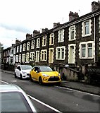 ST1597 : Yellow car and white car, Cardiff Road, Pengam by Jaggery