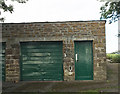 Former horse and cart shed, then a garage, and now a workshop