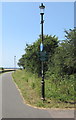 SS5433 : Dark green notices alongside the South West Coast Path, Barnstaple by Jaggery