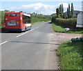 Stagecoach bus passes the entrance road to Square Farm Shop, Mitchel Troy