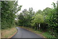 The North Downs Way (narrow path to right of sign) leaving Pineham