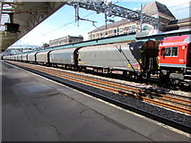 ST3088 : Long freight train in Newport station by Jaggery
