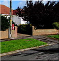 Queen Elizabeth II postbox on a wooden pole, Lon-yr-eglwys, St Brides Major