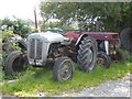 Old tractors beside the lane