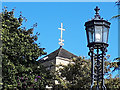 SE1633 : Bradford Cathedral - apex cross and streetlamp by Stephen Craven