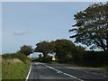 A395 entering Pipers Pool from the west